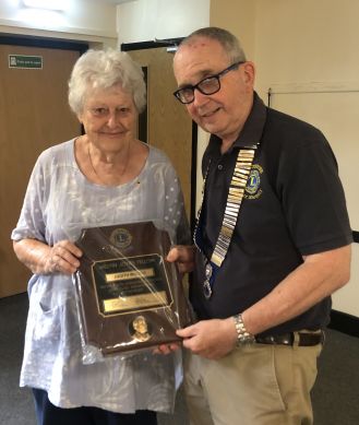 Lion Judith Woods was presented with a Melvin Jones Award by Lion President Peter Stonely Lion Judith Woods was presented with a Melvin Jones Award by Lion President Peter Stonely
