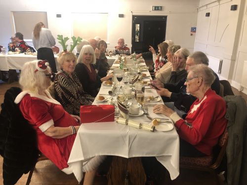 Special guest Ian Davidson (on the right in his red Christmas jumper) was a Lion for 60 years Special guest Ian Davidson who was a Lion for 60 years