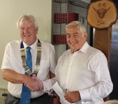 Lion Malcolm Luxton receiving the Maidstone Lions Club President's chain of office from Lion David Priestley Lion Malcolm Luxton receiving the chain of office from Lion David Priestley